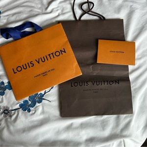 Authentic Louis Vuitton Shopping Bags and One Receipt Envelope